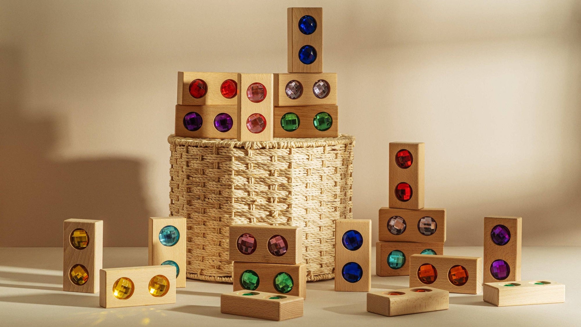 Wooden blocks with colorful pegs on a neutral background