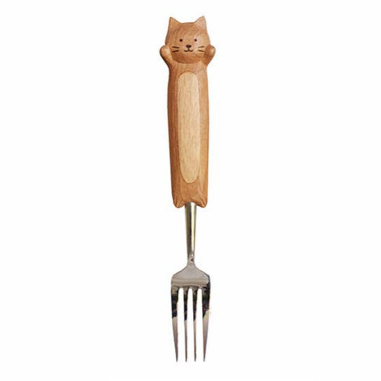 Wooden-handled fork with a cat design on a white background