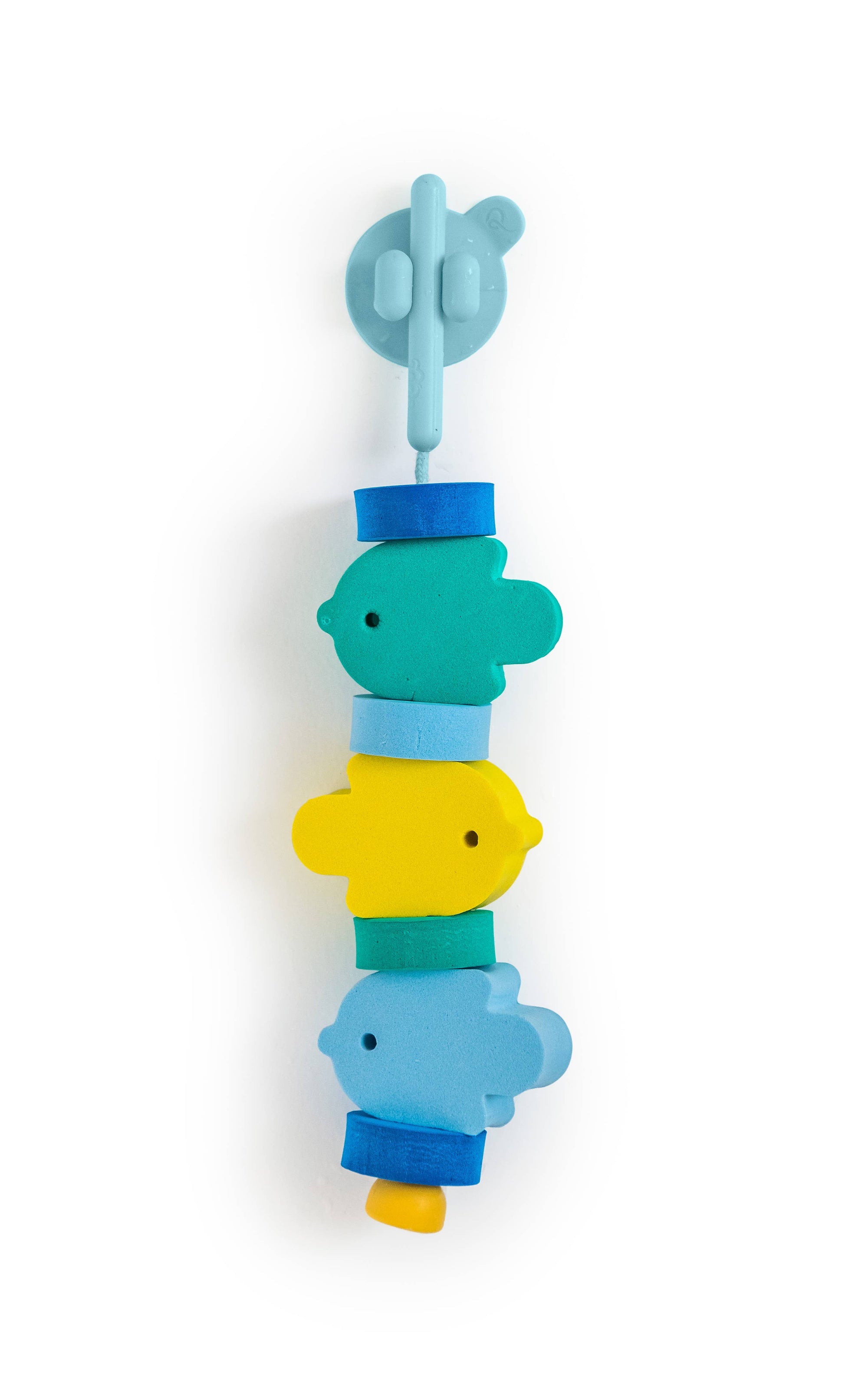 Colorful foam lacing toy with suction cup on a white background