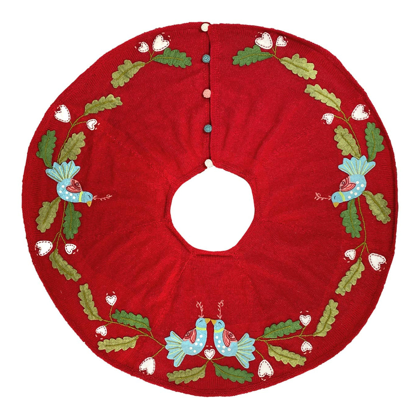 Red Christmas tree skirt with holly design on a white background