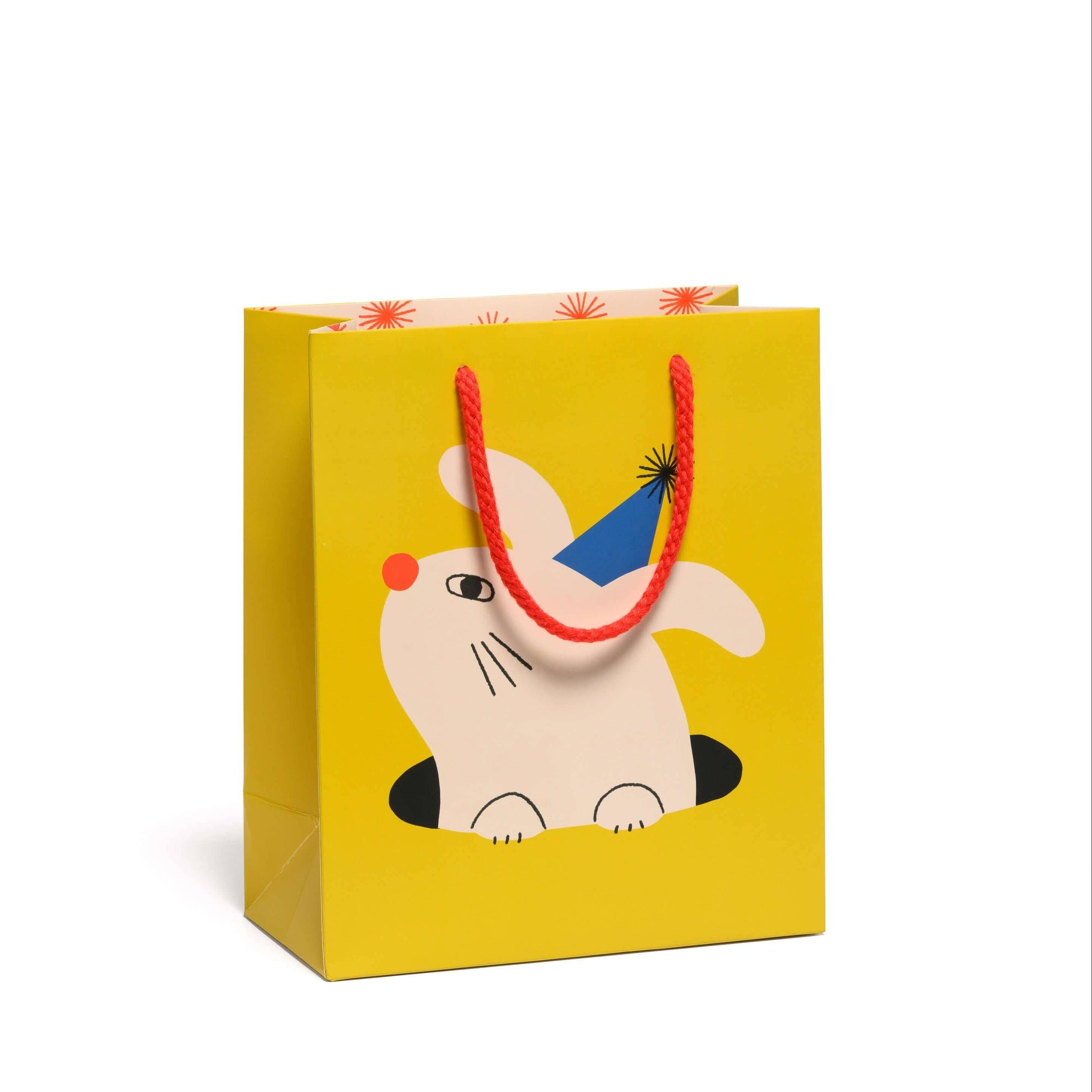 Yellow gift bag with a cartoon rabbit design on a white background