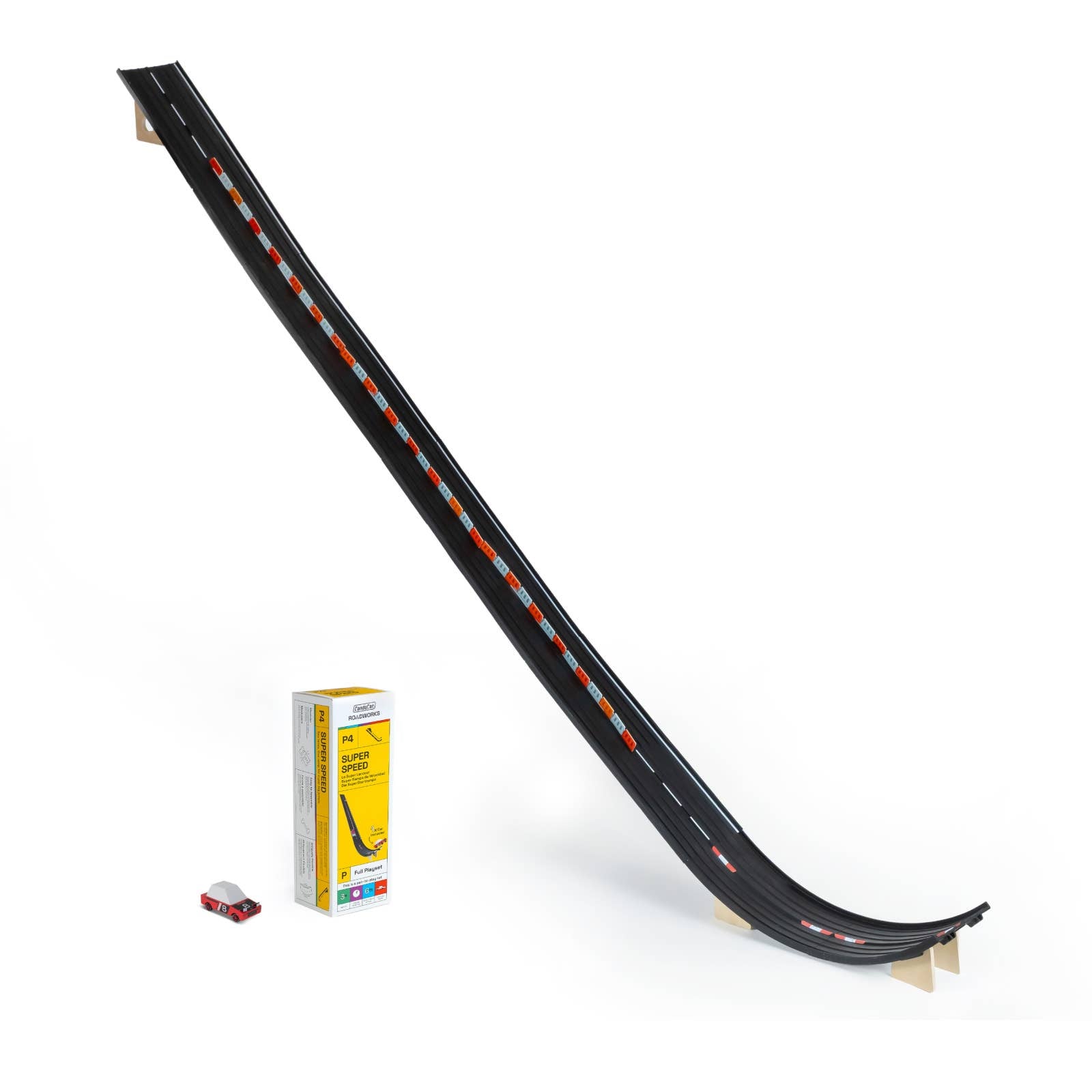 Toy race track with a small car and packaging on a white background