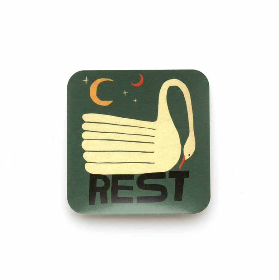 Coaster with a swan design and 'REST' text on a green background