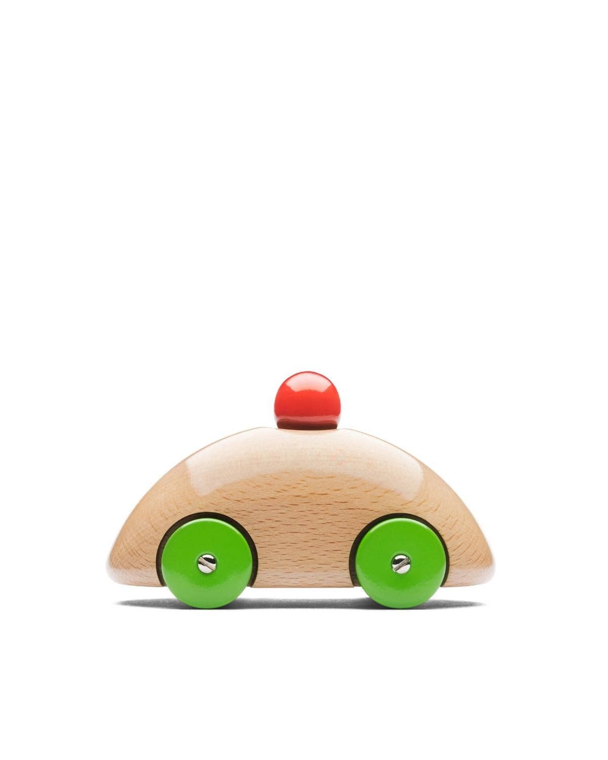 Wooden toy car with a red top and green wheels on a white background