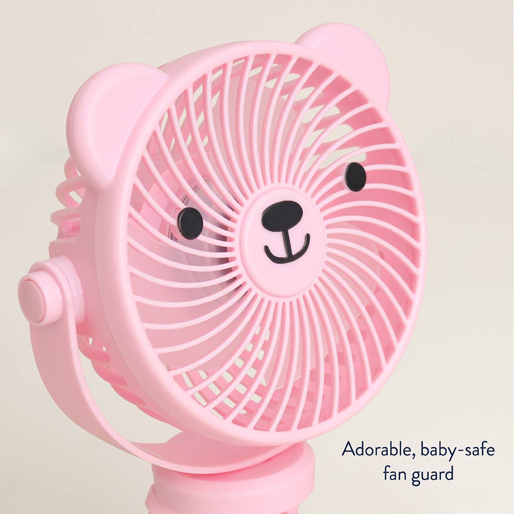 Pink fan with bear design on a light beige background