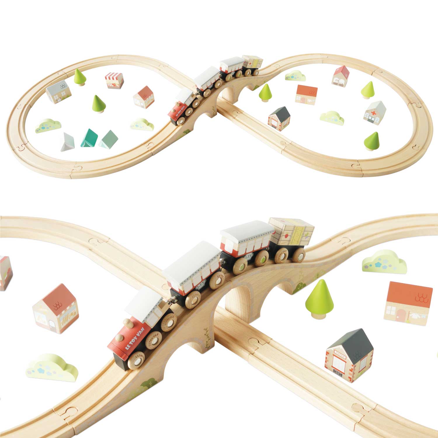 Wooden toy train set with tracks and small buildings on a white background