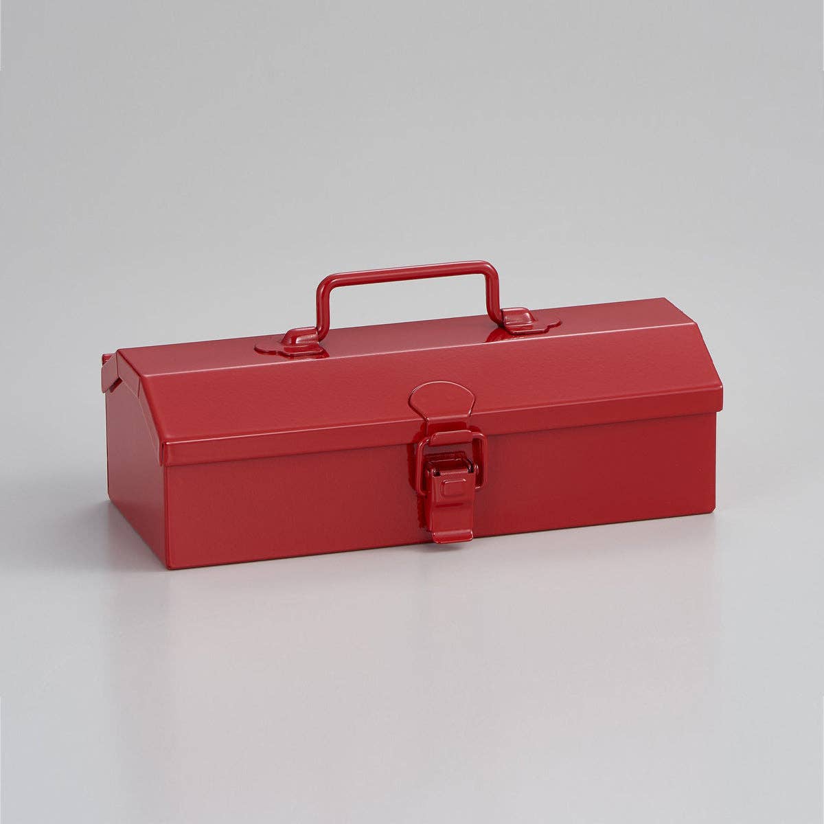 Red toolbox on a light gray background