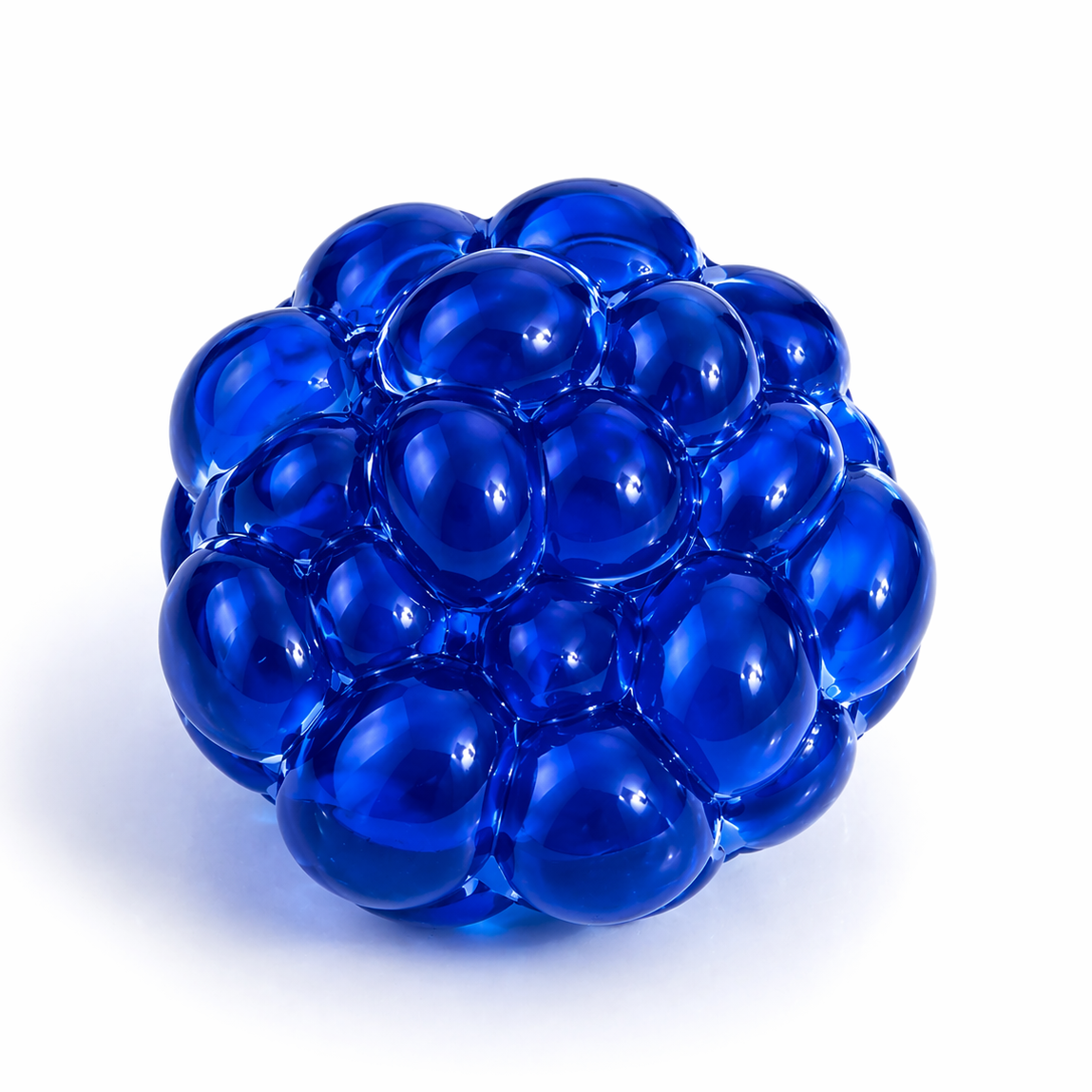 Blue stress ball with a textured surface on a white background