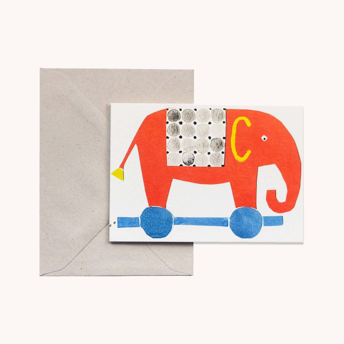 Colorful elephant card with a beige envelope on a white background