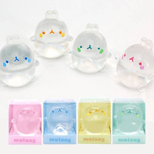 Set of cute, transparent animal-shaped keychains with colorful faces in their packaging on a white background.