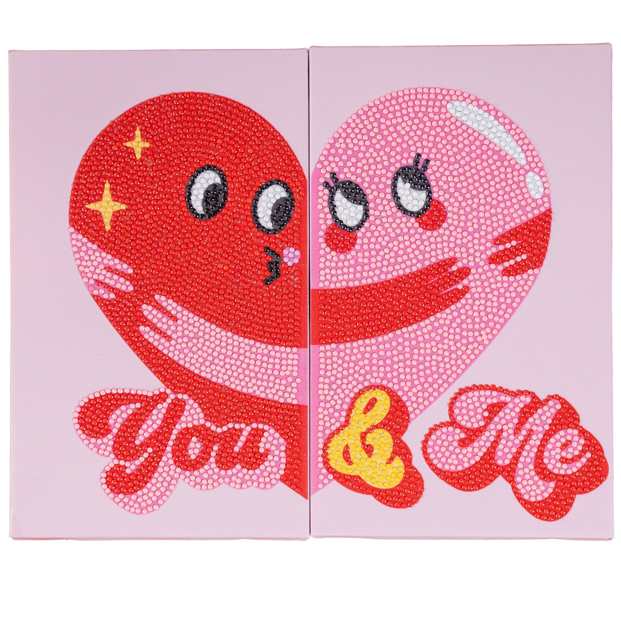 Two heart-shaped characters hugging with 'You & Me' text on a pink background