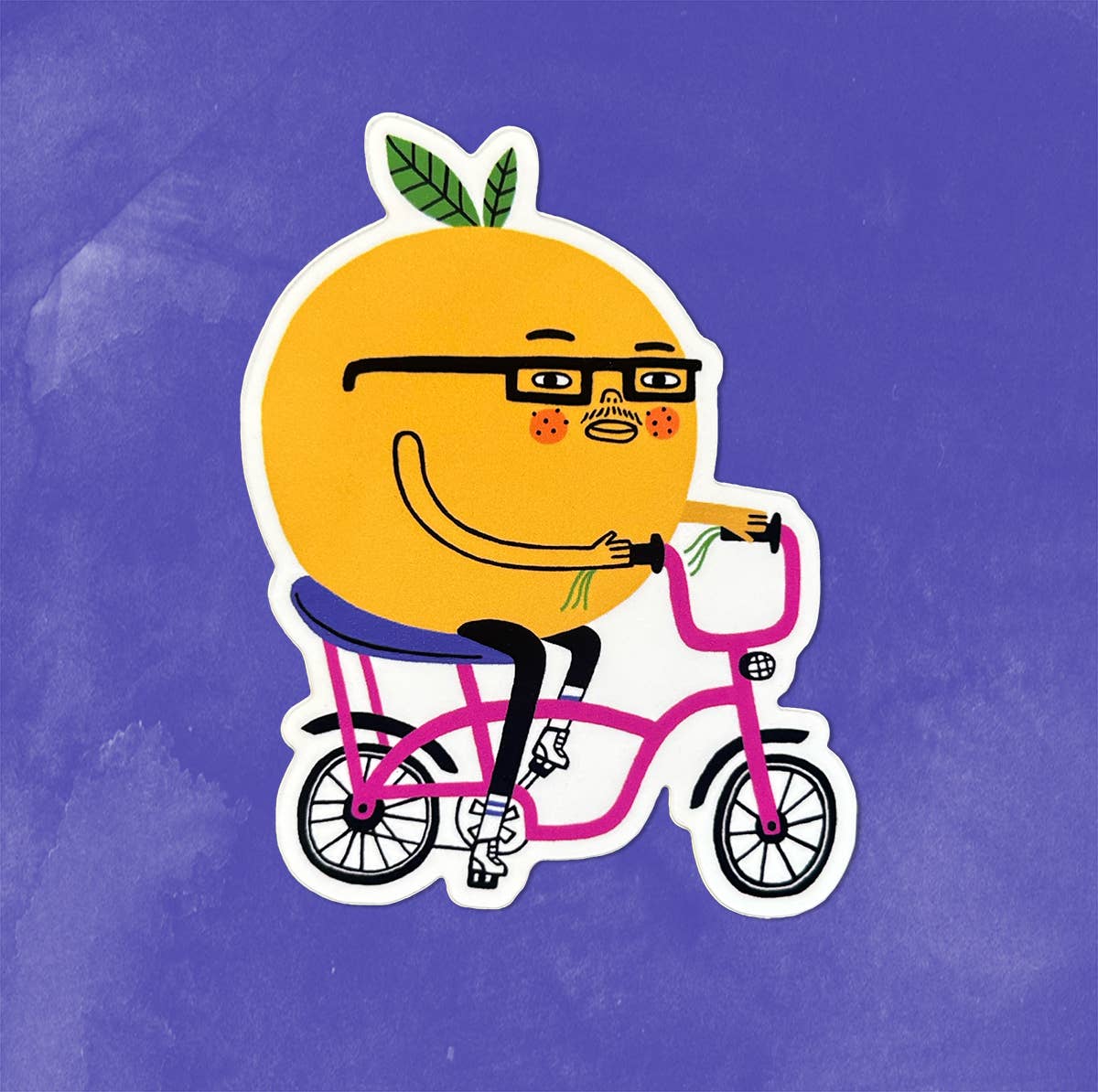A die-cut sticker featuring a stylized yellow citrus fruit character with green leaves, glasses, and a pink bicycle, shown on a textured purple background.