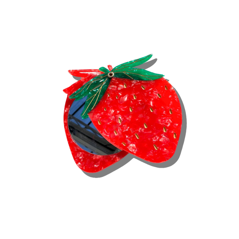 Strawberry-shaped sunglasses with a green stem on a white background