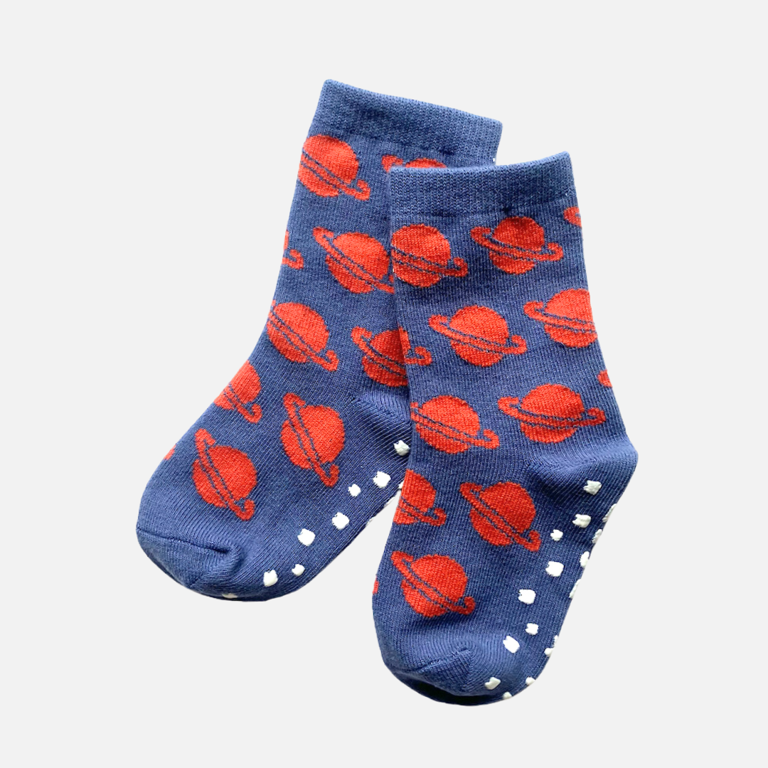 Blue socks with red planet pattern on a white background