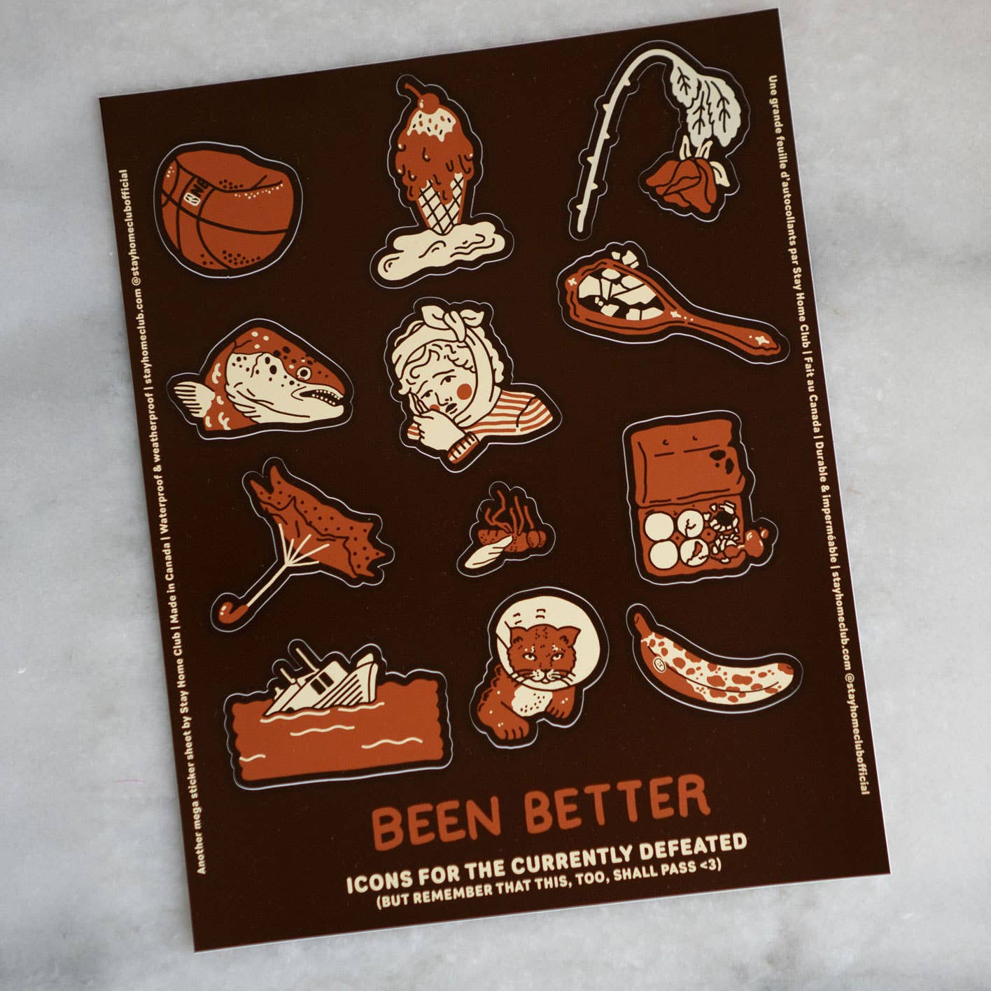 Sticker sheet with various illustrations and text on a brown background