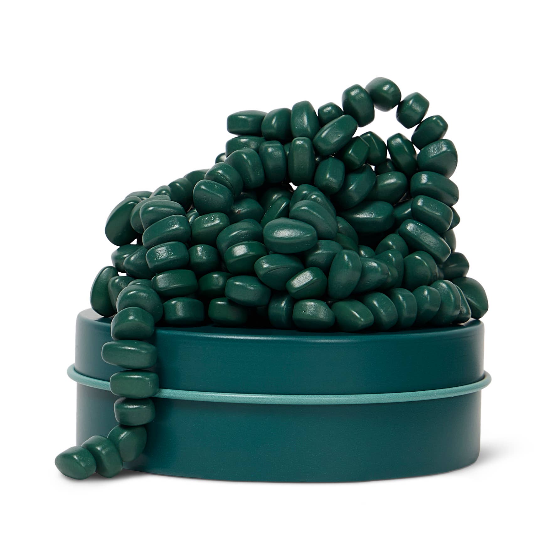 green magnets with a storage container on a white background