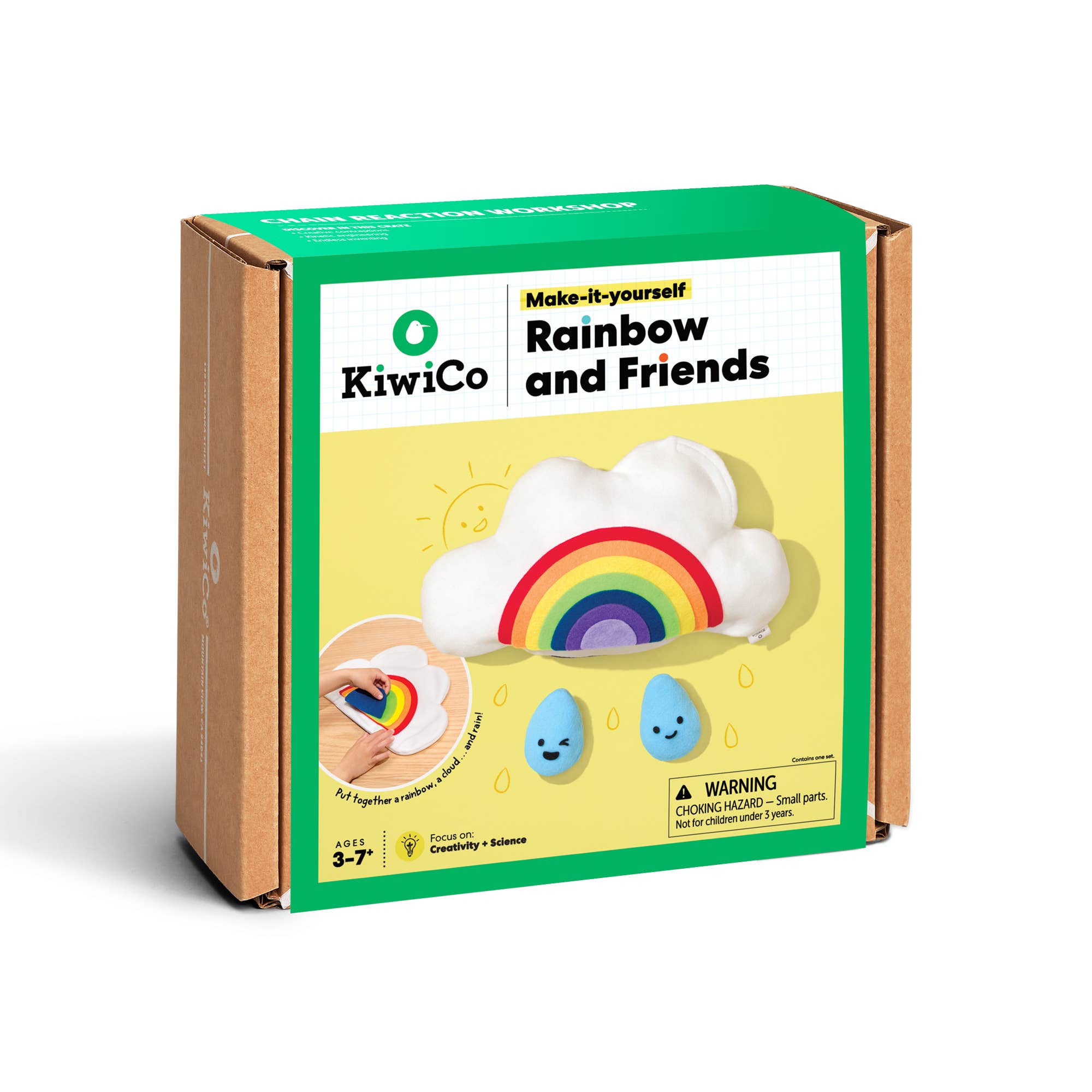 KiwiiCo Rainbow and Friends craft kit in its original green and yellow cardboard packaging, featuring a rainbow cloud and smiling raindrop illustrations.