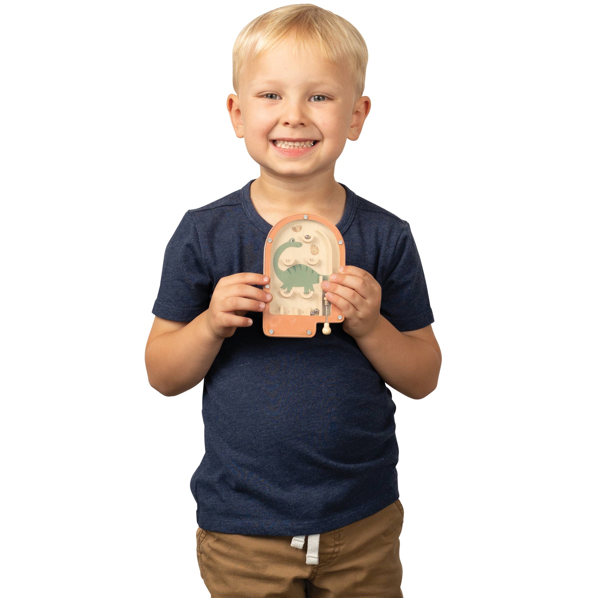 Child holding a dinosaur toy against a white background