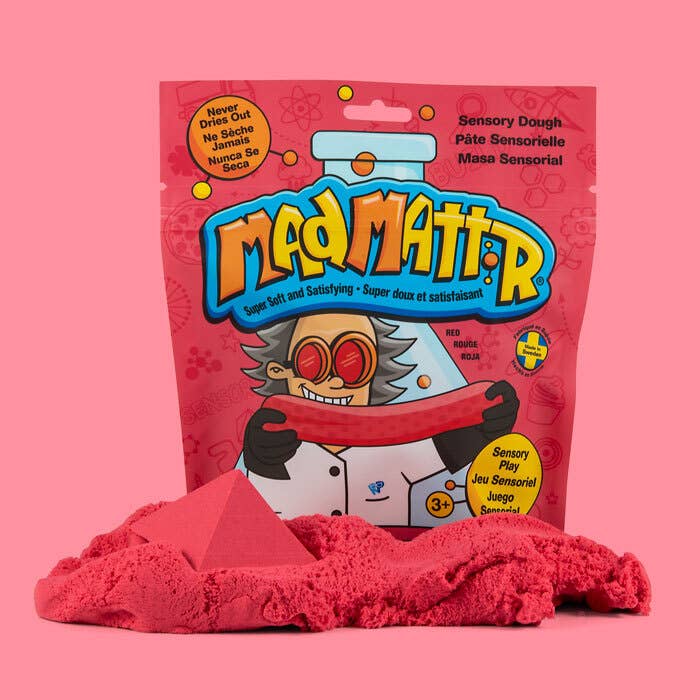 Packaging of MagMatter sensory dough with red play dough on a pink background