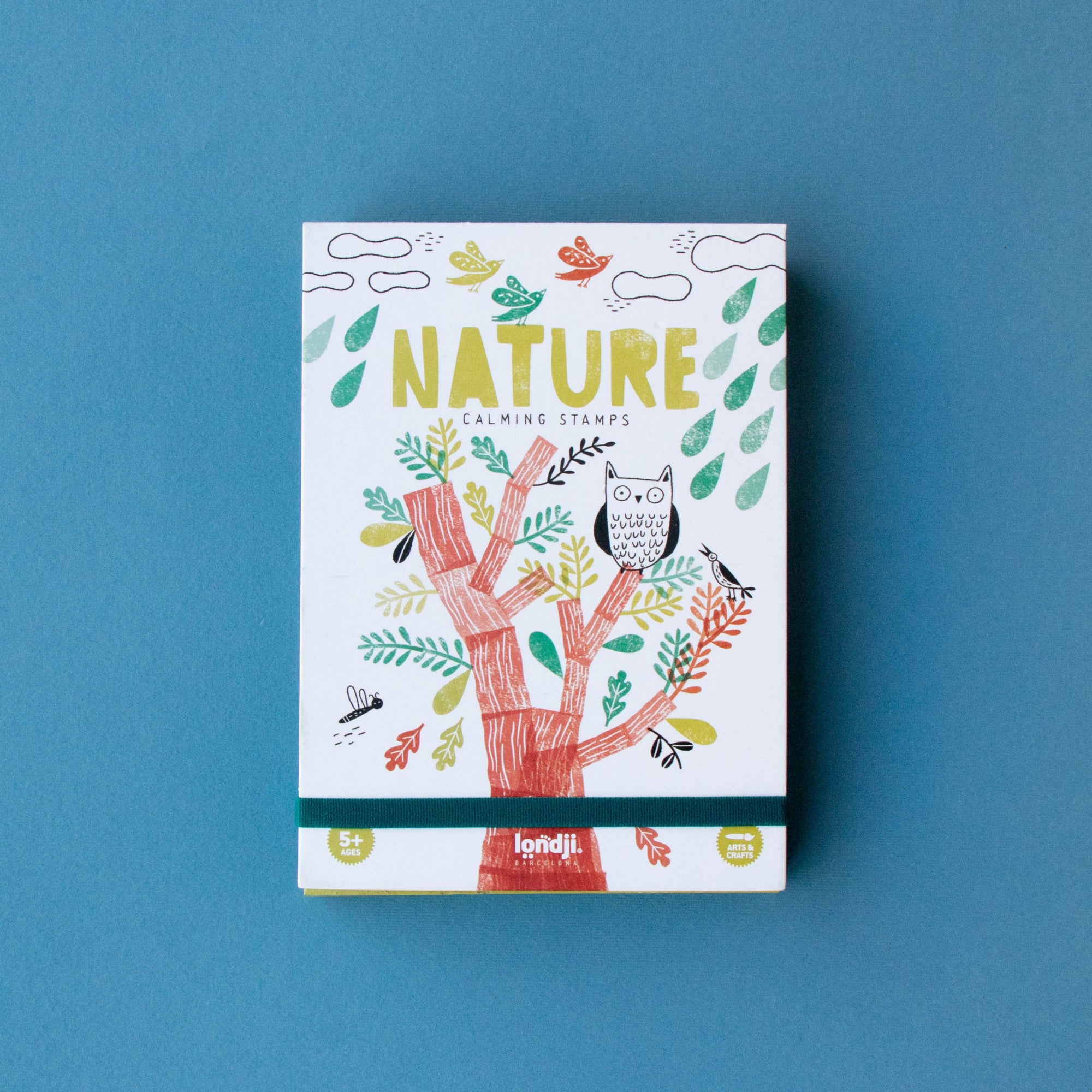 Colorful book titled 'Nature' on a blue background