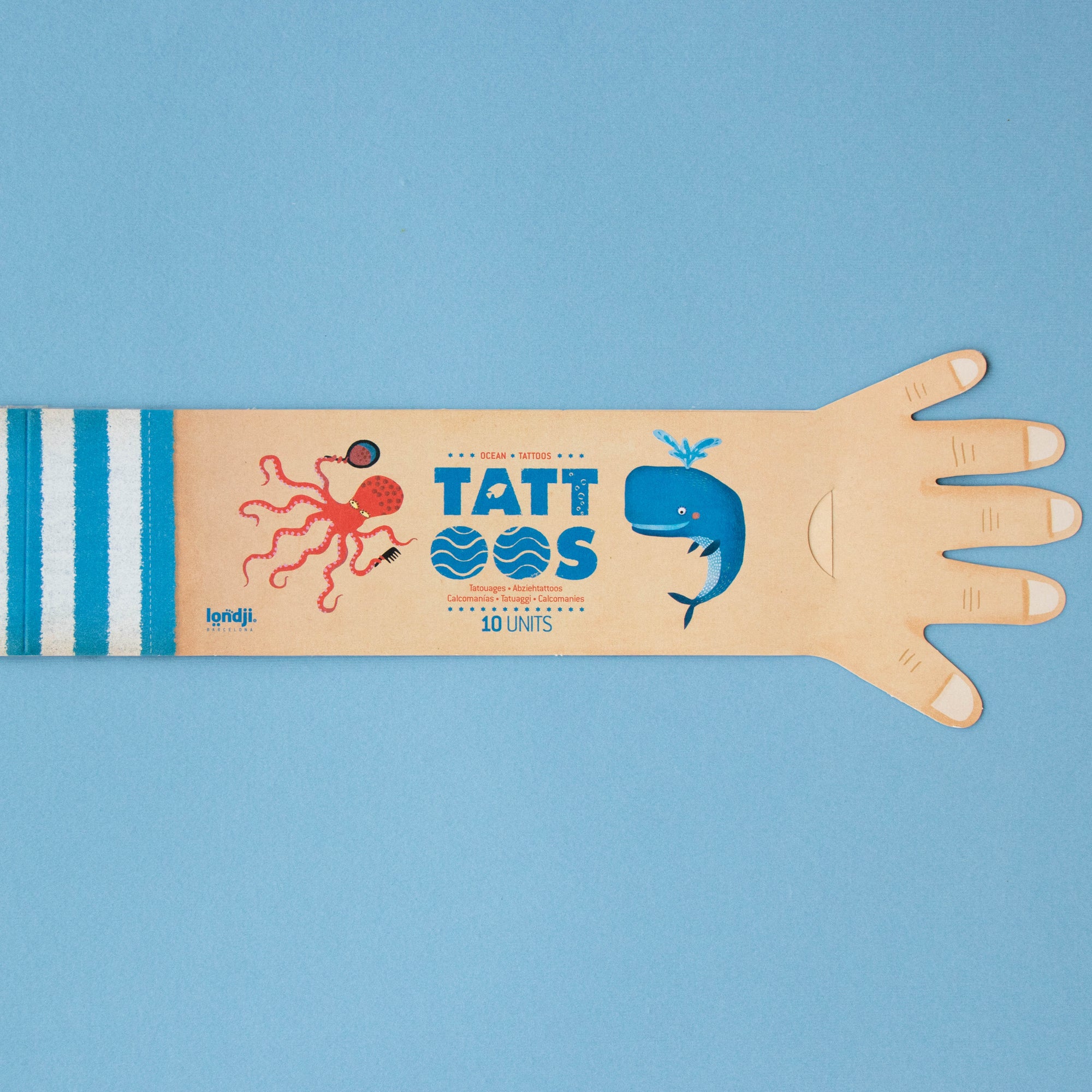 Tattoo sheet packaging with cartoon designs on a blue background