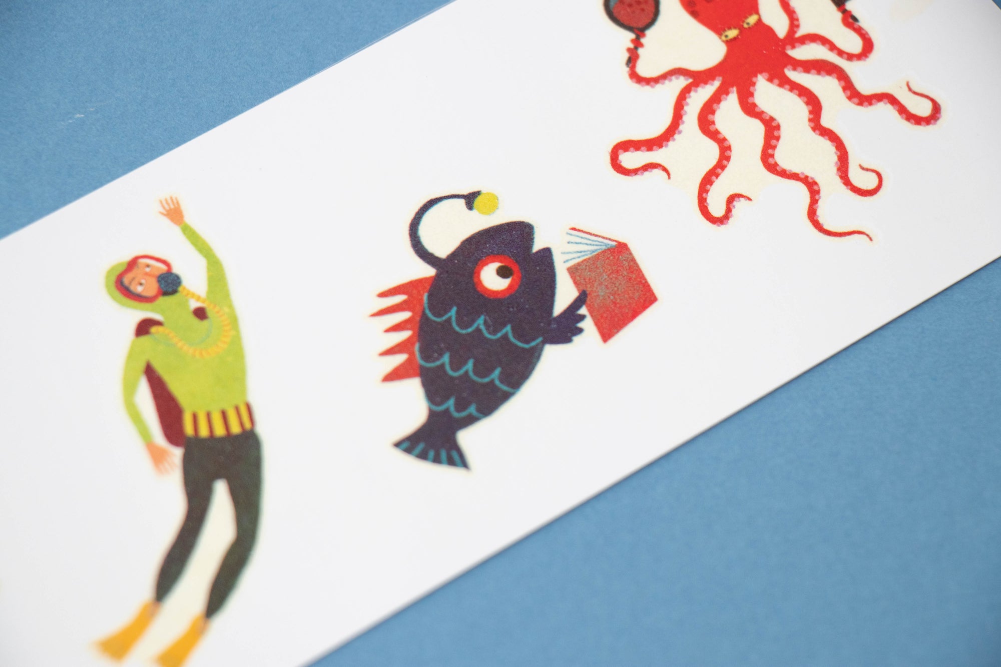 Tattoo Illustrations of a diver and fish on a background