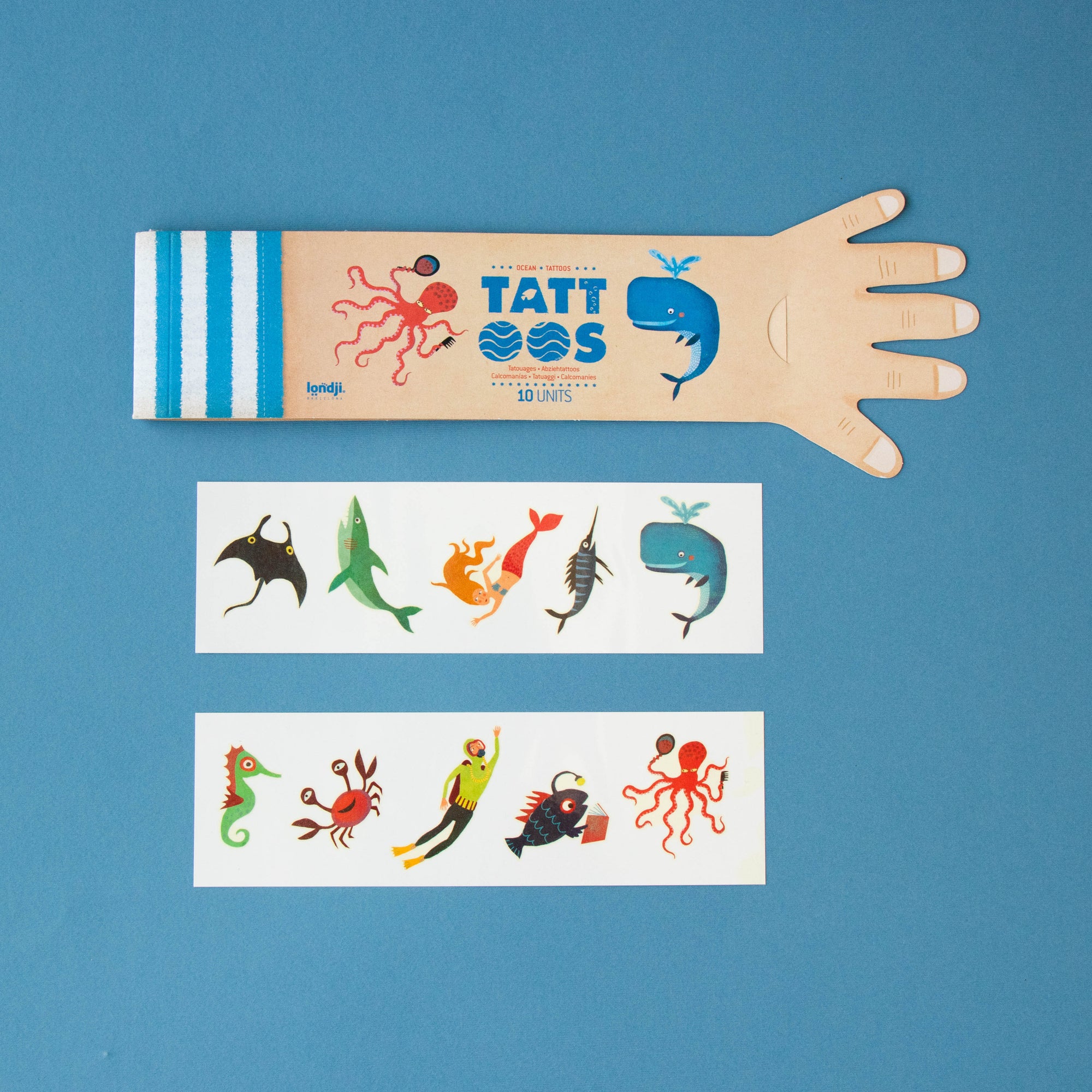 Tattoo sleeves with various designs on a blue background
