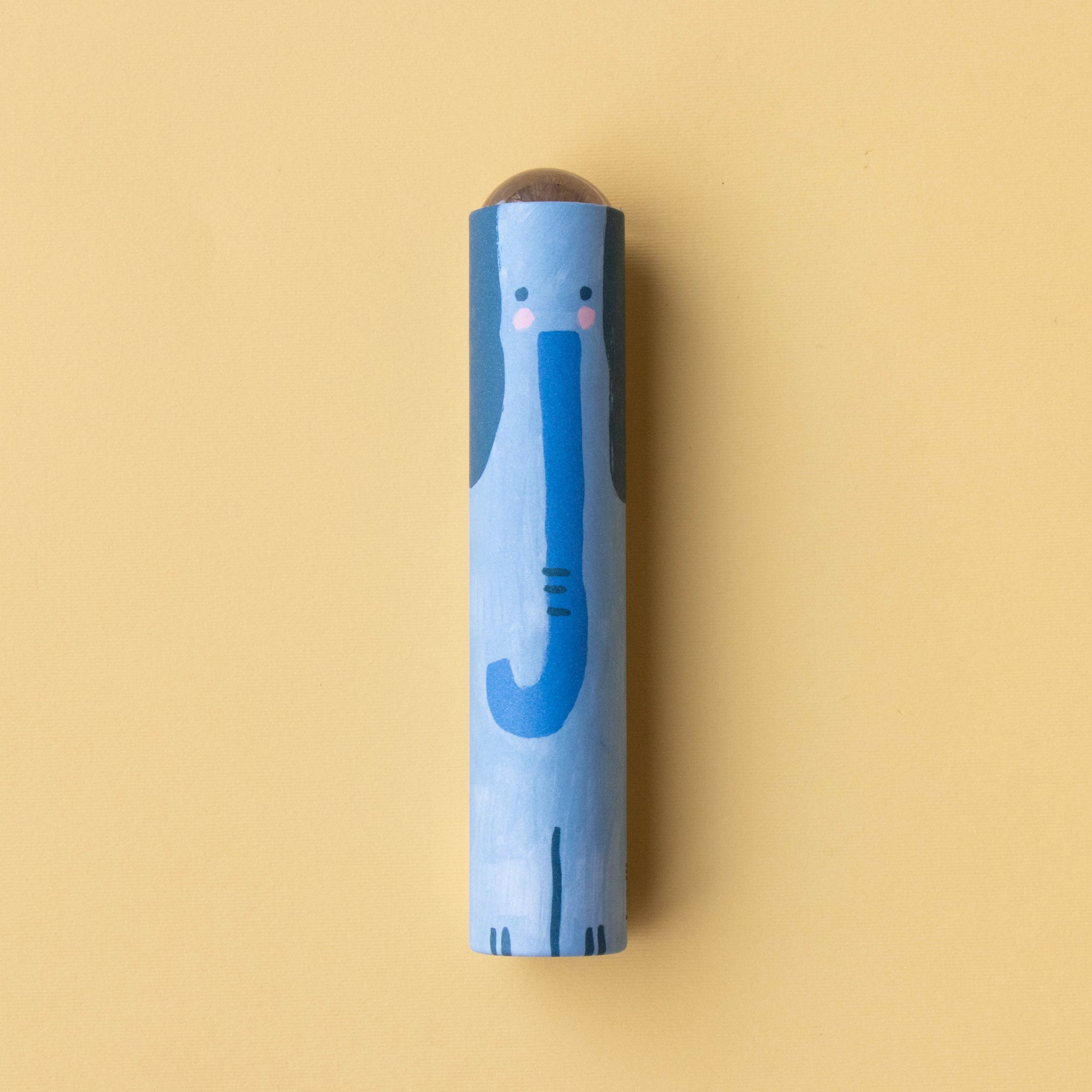 Blue Kaleidoscopes with a cartoon face on a beige background