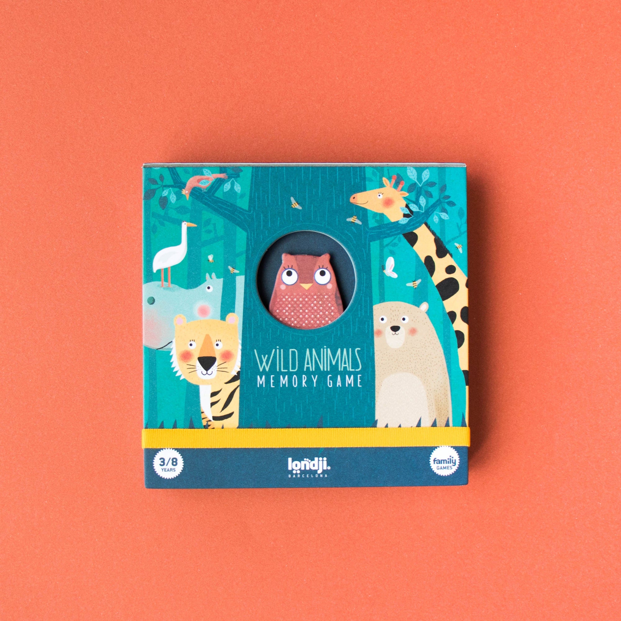 Children's memory game box with animal illustrations on a red background