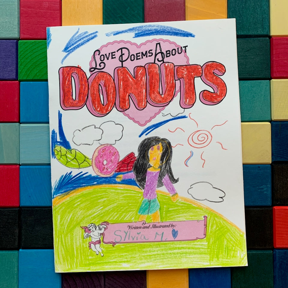 Colorful book cover of 'Love Poems About Donuts' with a child-like illustration on a multicolored block background.
