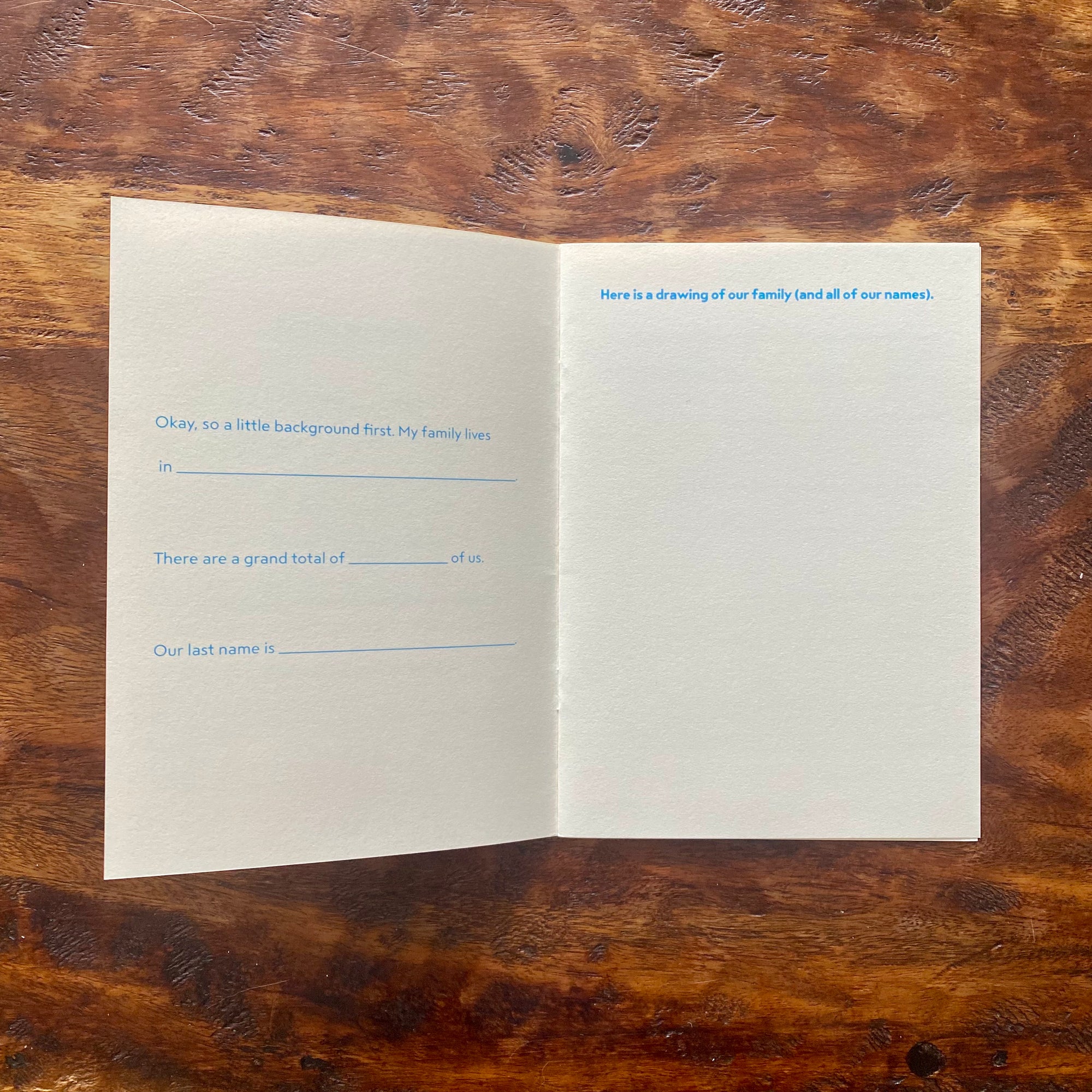 Open book with text on a wooden surface
