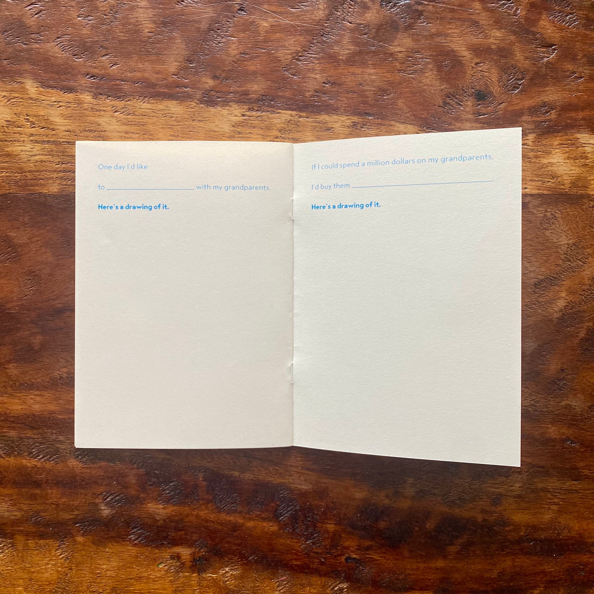 Open card with text on a wooden surface