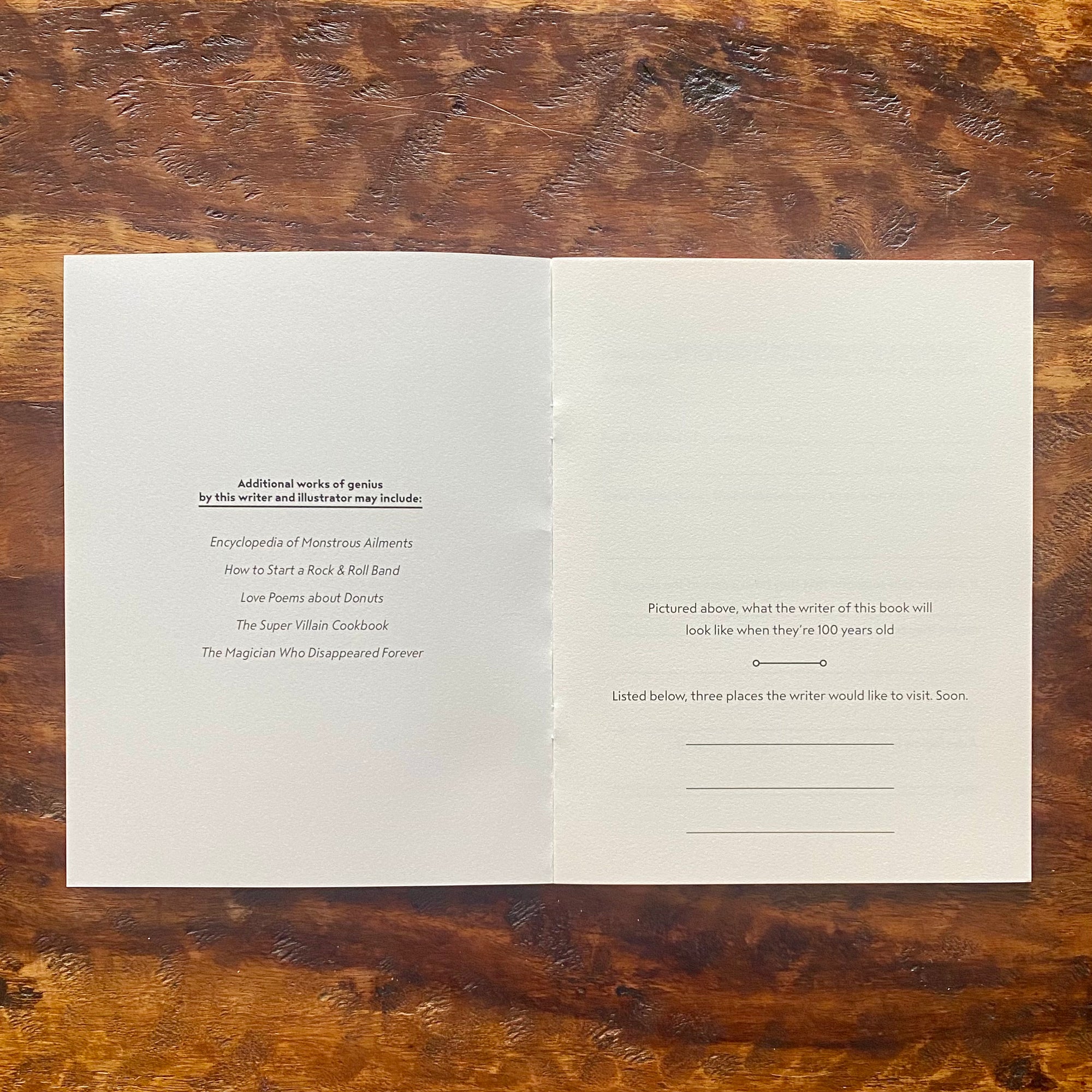 Open book with text on a wooden surface