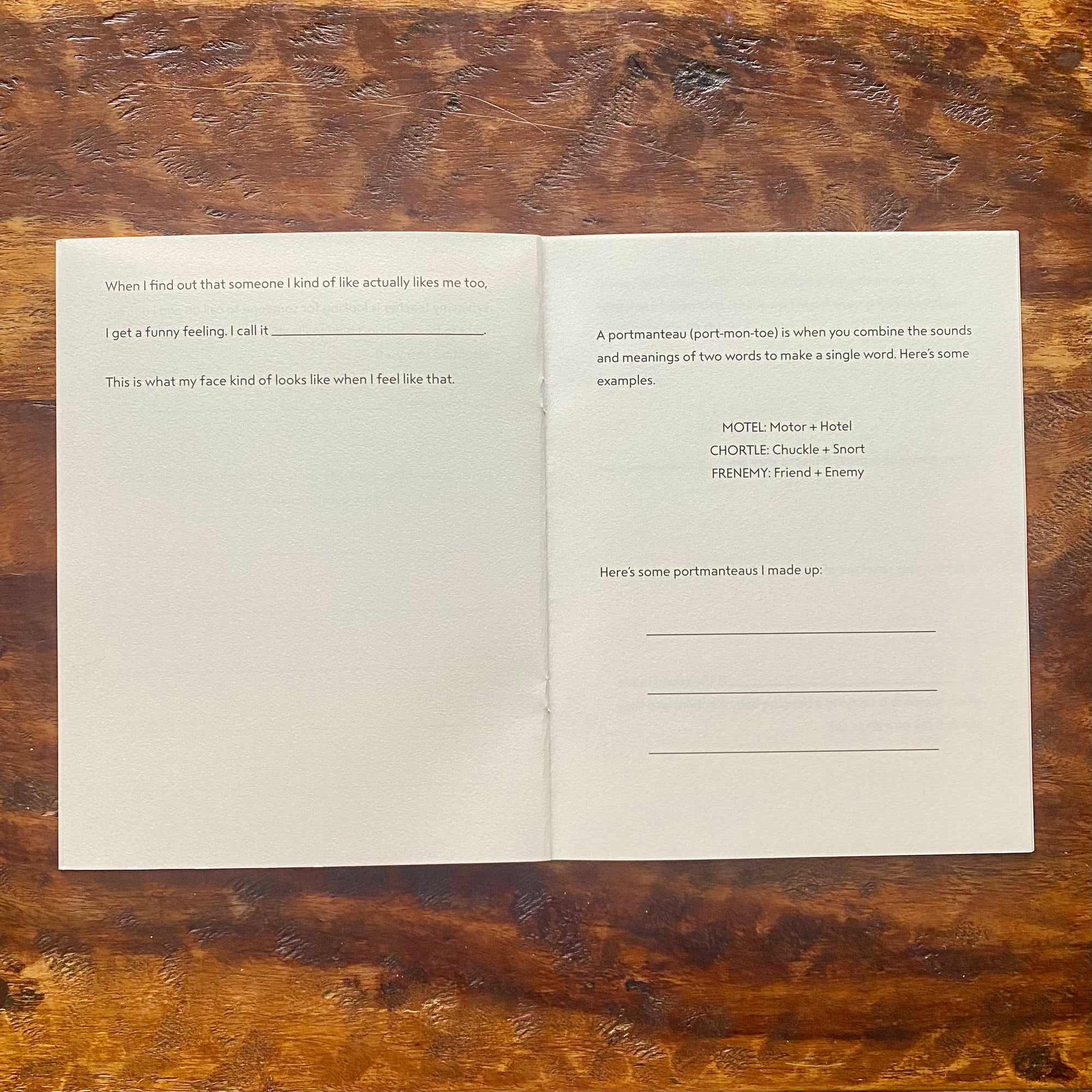 Open book with text on a wooden surface