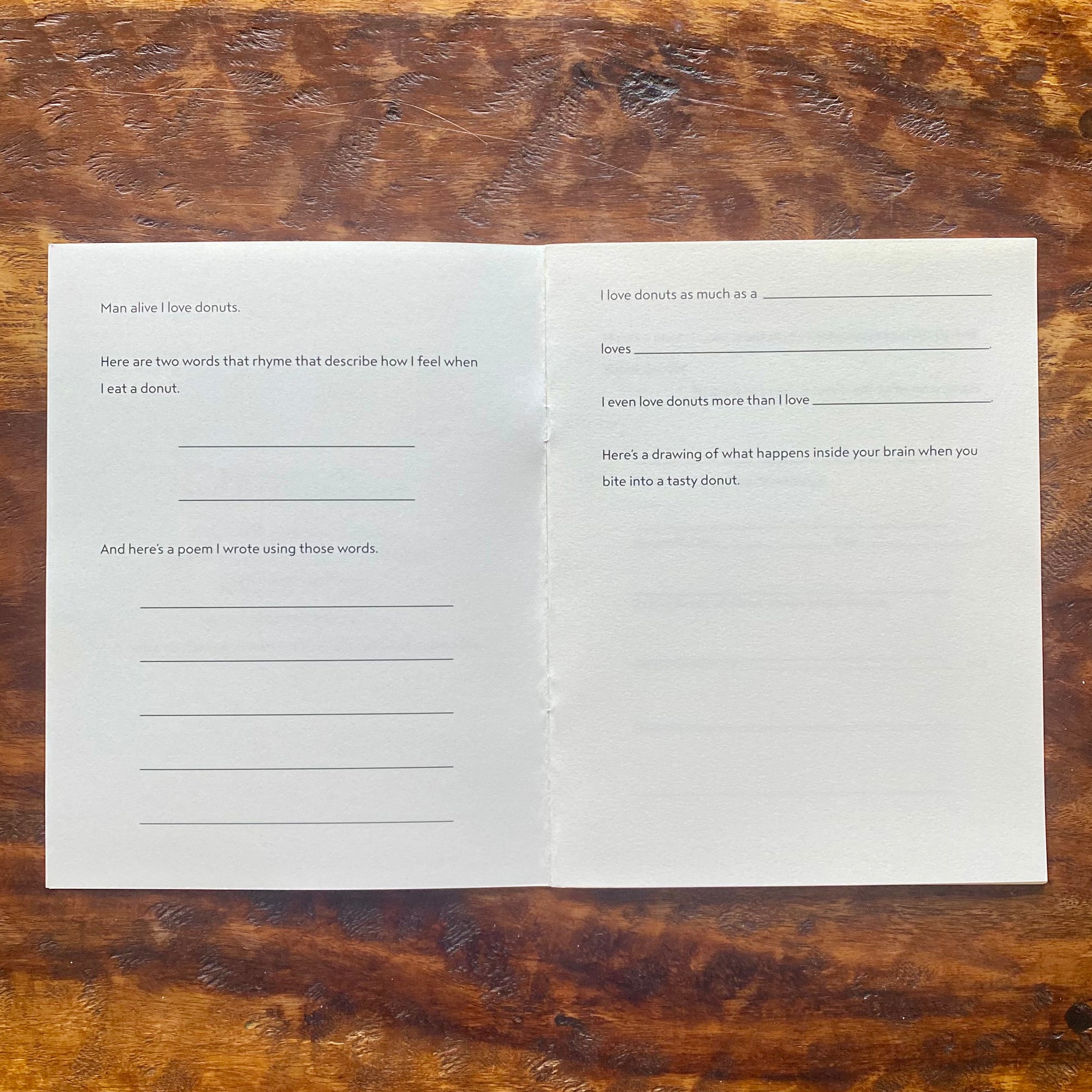 Open book with text on a wooden surface