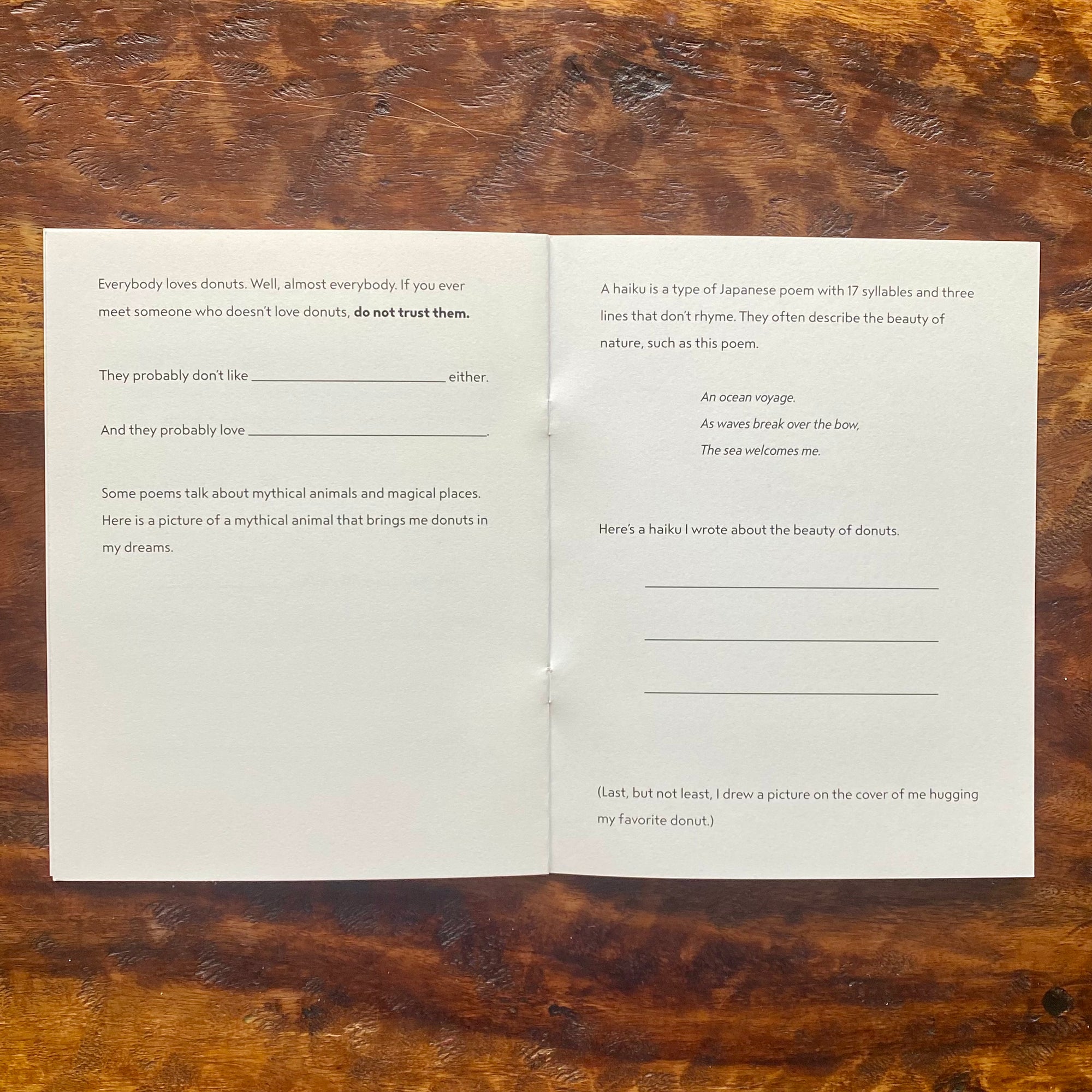 Open book with text on a wooden surface