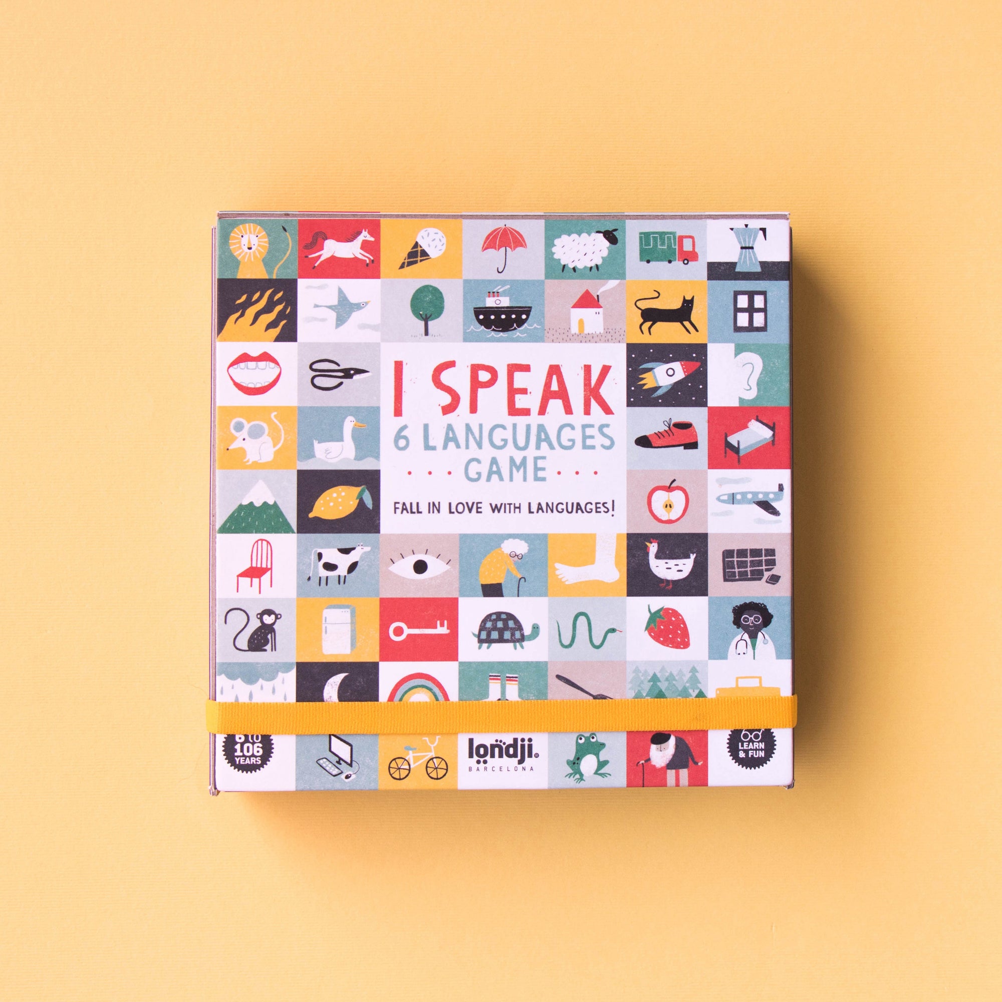 Board game box titled 'I Speak 6 Languages' on a yellow background