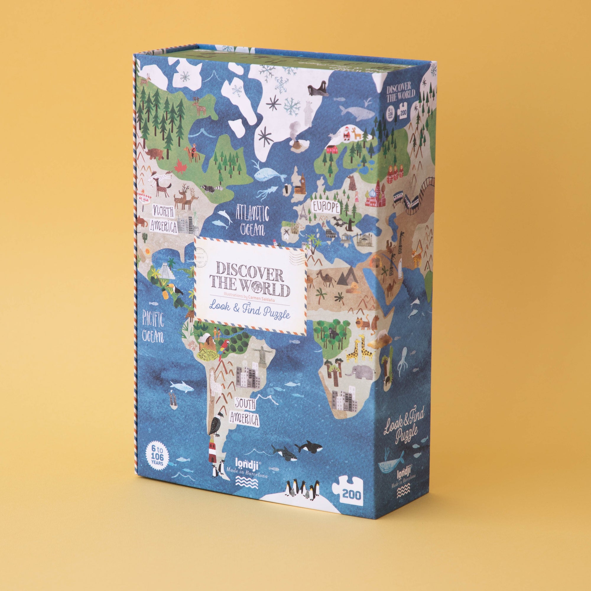 Jigsaw puzzle box with world map design on a yellow background