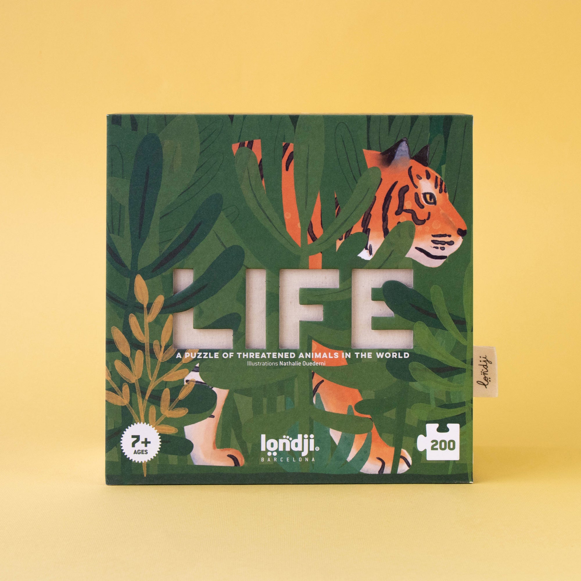 Jigsaw puzzle box with animal illustrations on a yellow background