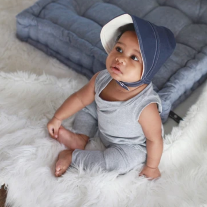 baby wearing blue sun bonnet