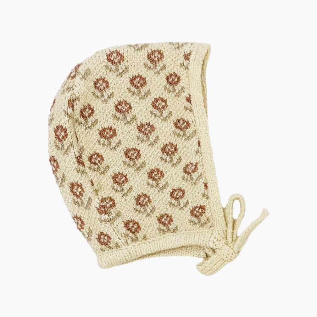 Minikane Babies  – Elie Knit Bonnet Wildflowers Brick 28cm/11in