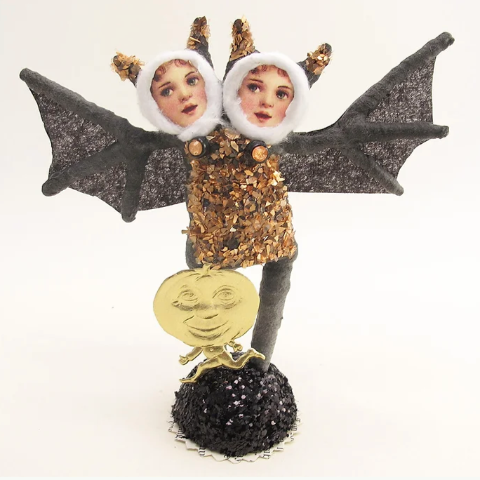 Double Headed Bat Child Figure