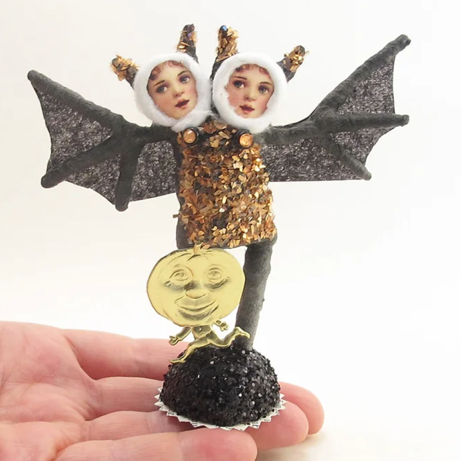 Double Headed Bat Child Figure