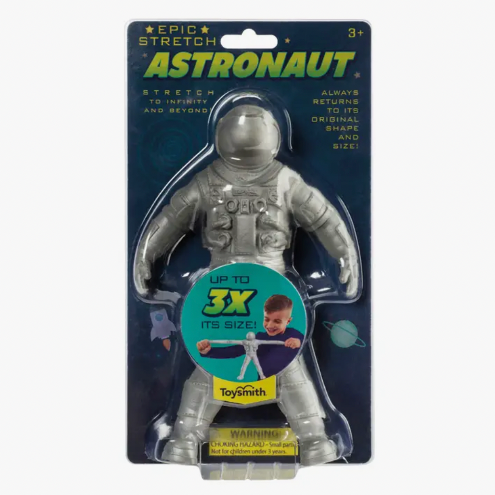 Packaged 'Epic Stretch Astronaut' toy in a clear plastic blister on a card with the product information and a small illustration of a child playing with the toy.