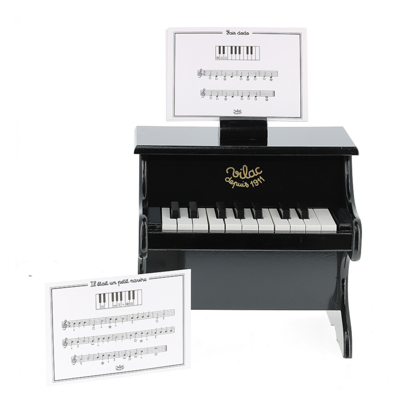 18-key black piano with sheet music