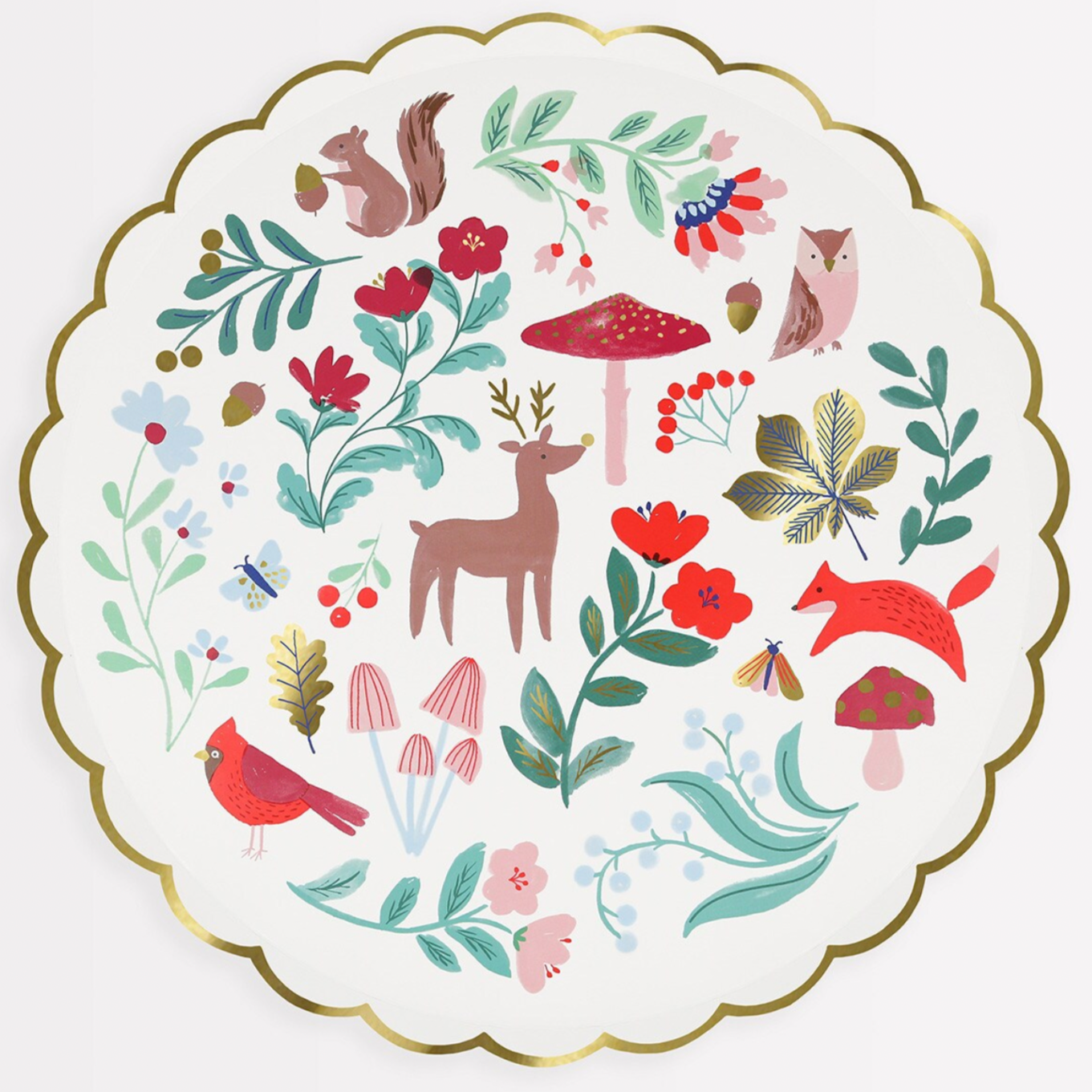 A round paper plate with a festive illustration of reindeer, squirrels, birds, flowers, and mushrooms in red, brown, and green colors, with a scalloped border and gold foil details.