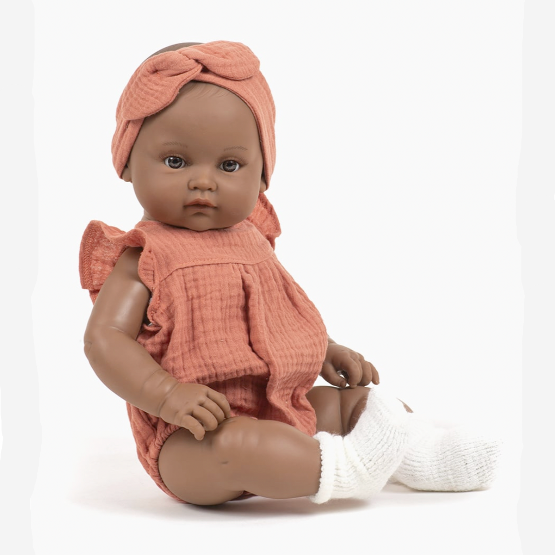 Augustine dressed in her marsala cotton gauze romper -47cm