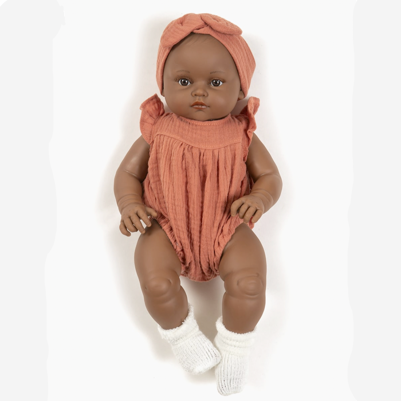 Augustine dressed in her marsala cotton gauze romper -47cm