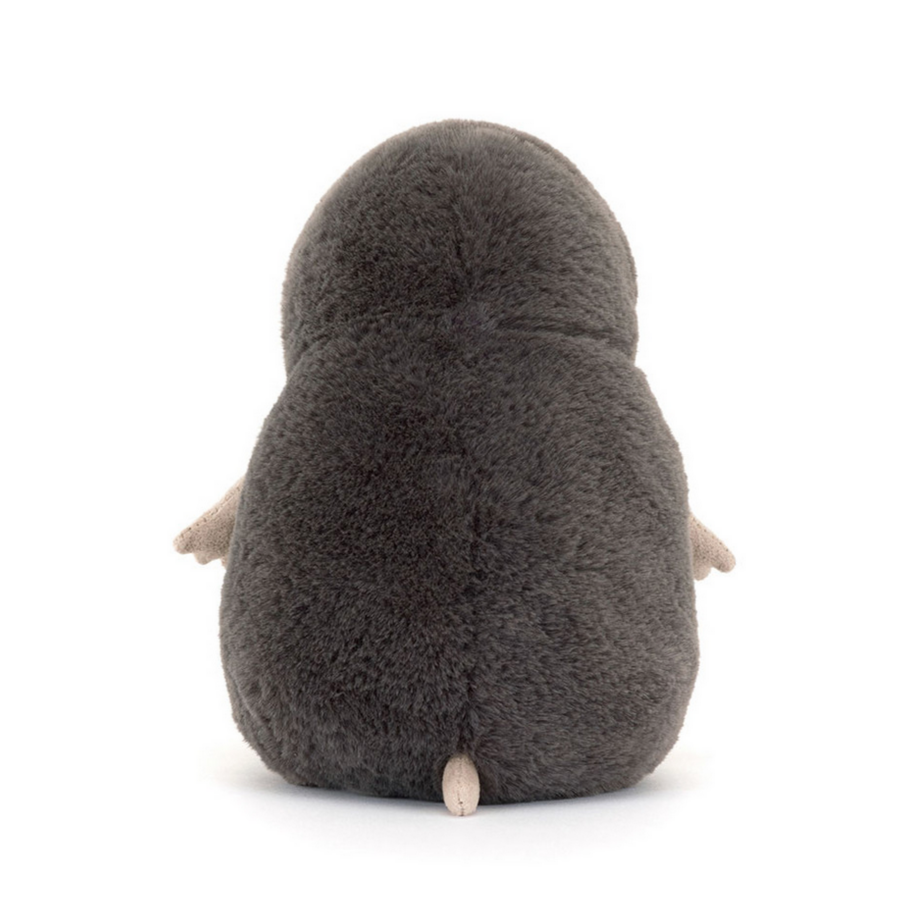 Stuffed toy muswell mole on a white background