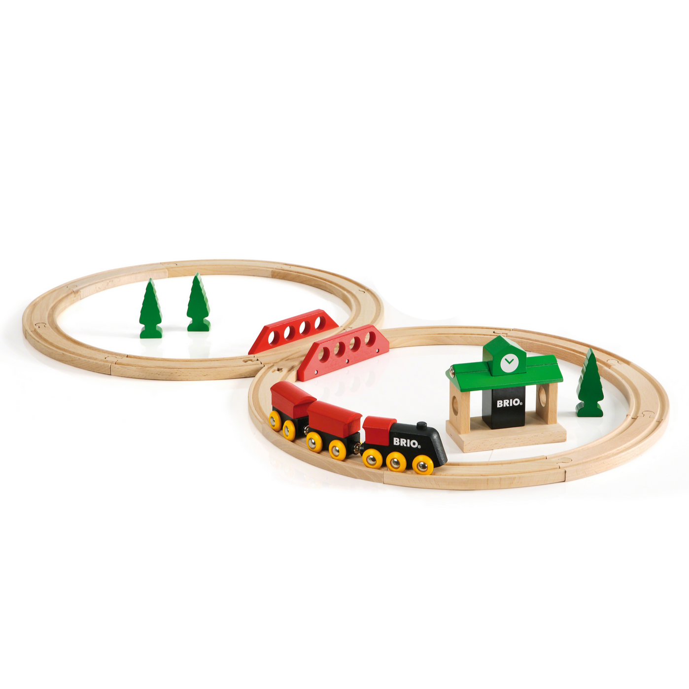Wooden toy train set with tracks and trees on a white background.